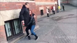 Russian Girl Lift and Carry People in the Street