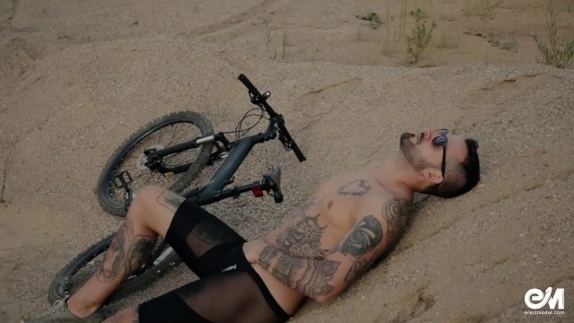 Full Body Tattoo Man on Bicycle Strips and Shows his Uncut Foreskin Cock