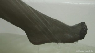 Black Stockings in the Bathroom and under the Shower