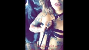 Tattooed Girl Shows Leather Dress with Collar and Leash