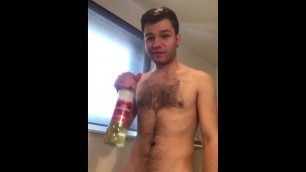 Cute Lad Pisses in a Bottle and Takes a Swig