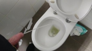 Pissing in University Toilet