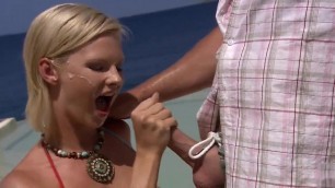 Tarra White giving a fancy oral by the sea